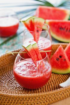 Watermelon juice with some pieces of watermelon