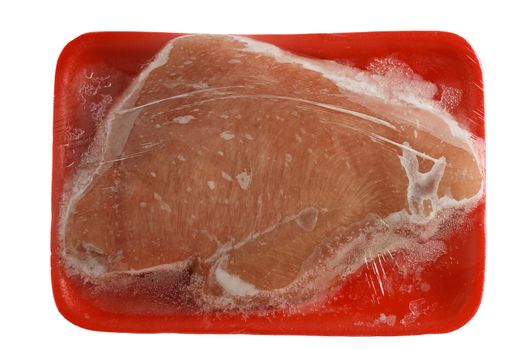 Top view of frozen raw turkey breast on foam meat tray isolated on white background