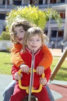 two little girls preschool playing the park playground