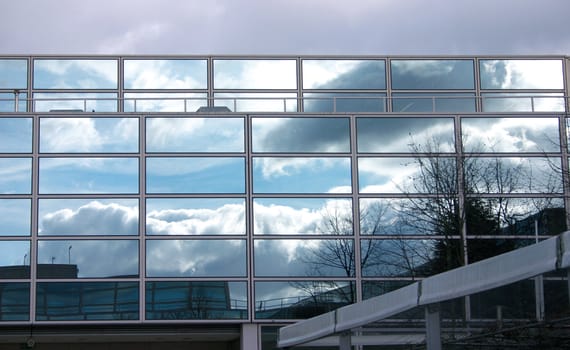reflection of blue sky in modern building