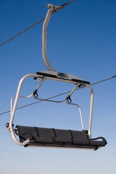 Chair lift in winter resort