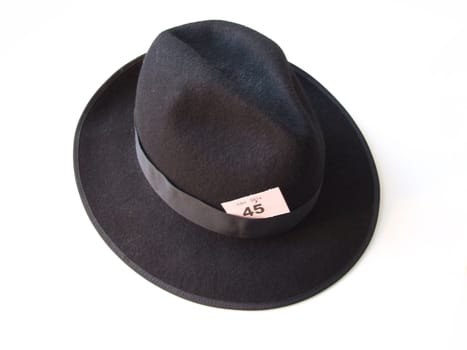 trilby hat on isolated background with ticket in band