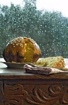 Brioche on a plate with granulated sugar garnish