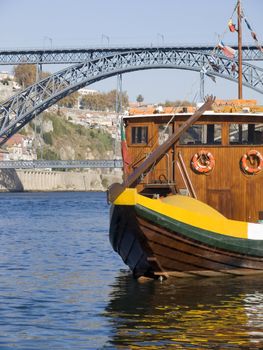 Cityscape with a typical portowine boat in the forground