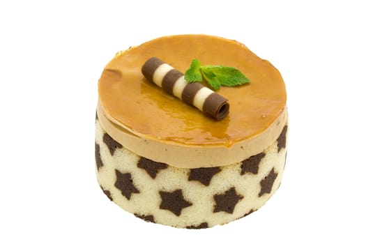 Caramel mousse cake on white background with clipping path