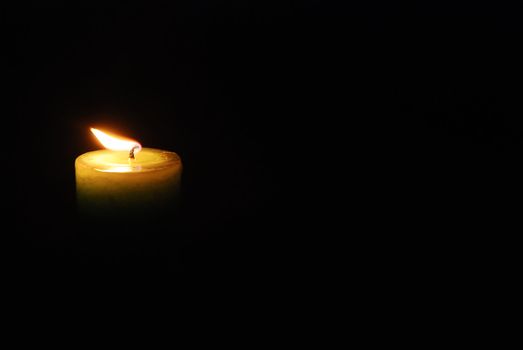 candle light in the black background