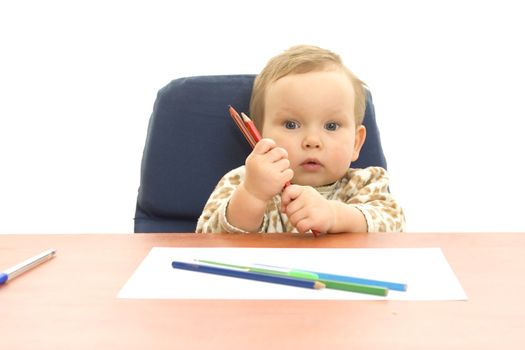 Baby with crayons and pecils isolated background