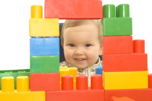 Cute baby girl with colorful blocks isolted background