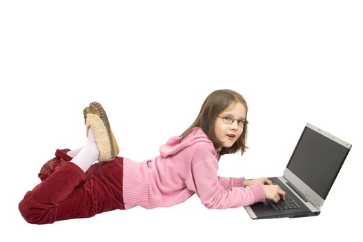 Young girl play of laptop isolated on white background