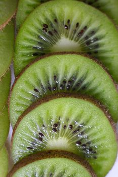 Fruits kiwi cut by slices close-up
