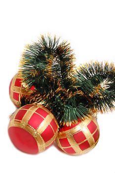Christmas decoration with balls and tinsel isolated on white