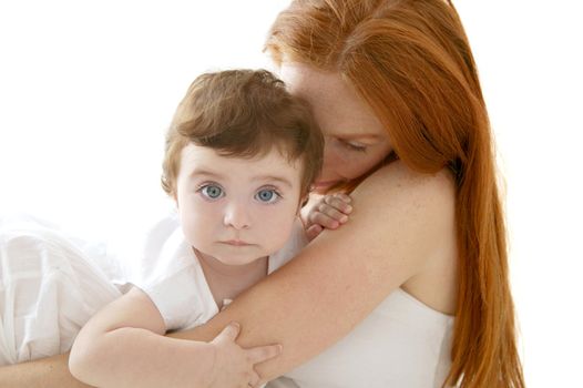 baby brunette and redhead mother love hug on white