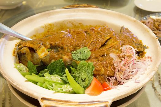 Nyonya Fish Head Curry with Mint Leaves Okra Tomato Onions and Spices