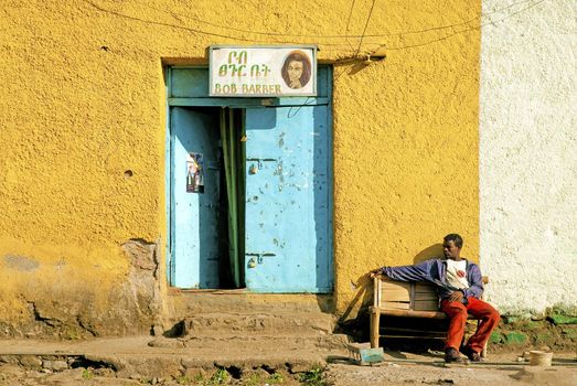 man outside Barber shop in gonder ethiopia