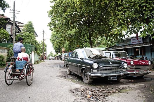 vintage cars on street in yangon myanmar burma