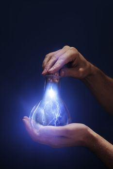 Conceptual image of a lightning captured in a bottle.
