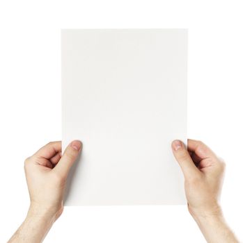 Man holding a blank light grey paper against white background.