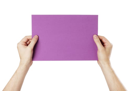 Man holding a blank purple paper against white background.