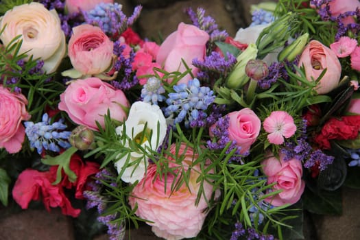 Floral arrangement in different shades of pink for a wedding