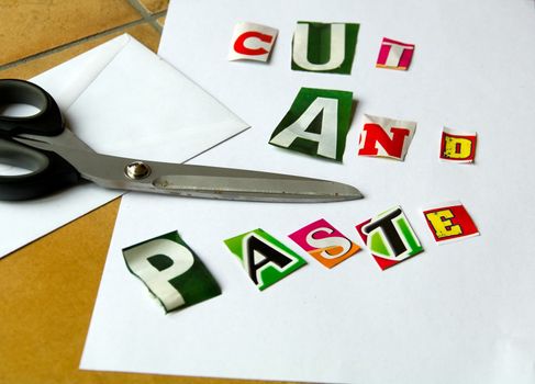 Cut and paste illustrated with letters cut from different newspapers