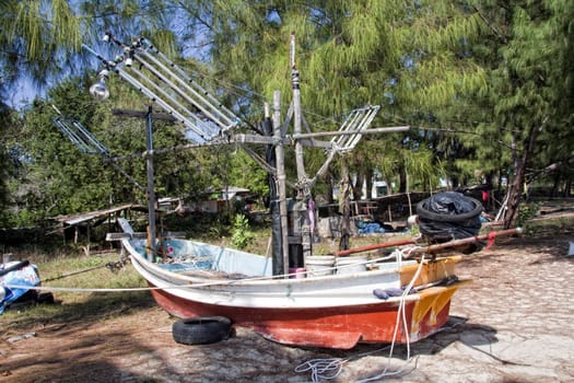 Fishing boat on beach, Tap Sakae, Thailand