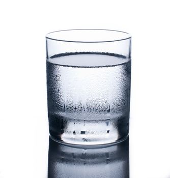 Glass of clear cold water isolated on white background