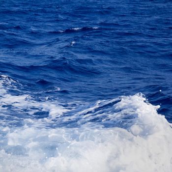 blue sea wave foam detail in square composition