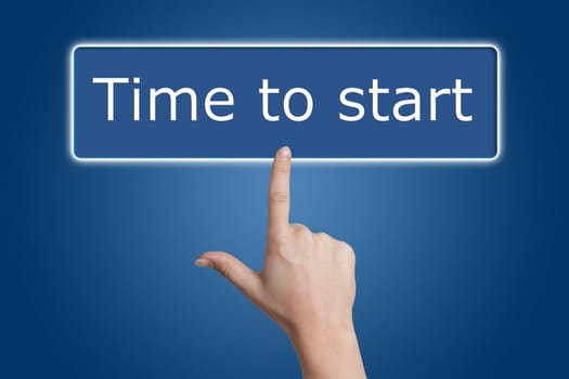 Woman hand pressing a button with word " Time to start " on blue background