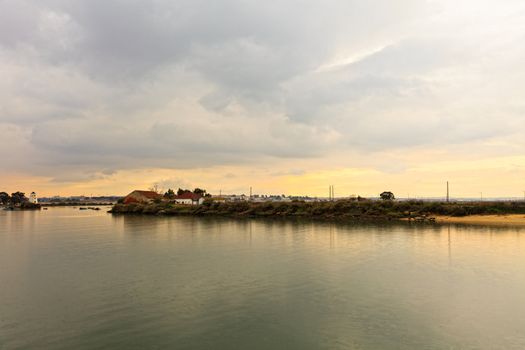 Sunset on the Tejo river with Barreiro mills in background.