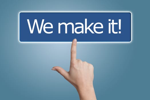 Woman hand pressing a button with word " We make it! " on blue background