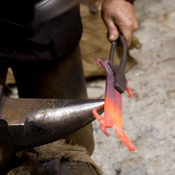 blacksmith forged iron smith anvil hammerman traditional hammer beating