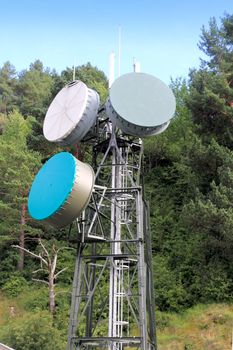 communication tower antenna in outdoor forest nature