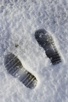 close up of footprints in snow