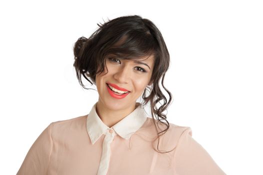 Portrait of a beautiful brunette in a pink blouse.