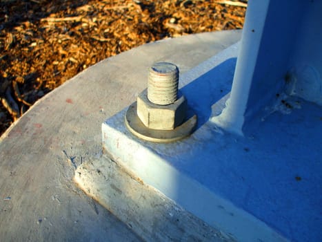 Close up of a concrete bolt.