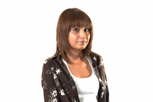 Portrait of the girl in a brown jacket on a white background