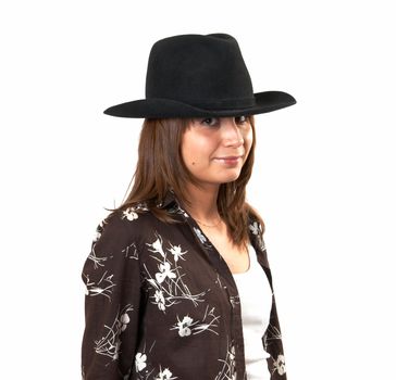 The girl in a brown jacket and a cowboy's hat