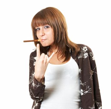 The girl in brown smoking a cigar 