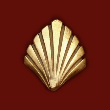 Way of Saint James symbol shell golden metal isolated