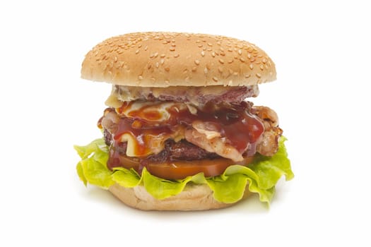 special burger with cheese, tomato, lettuce, meat, eggs, bacon and mustard sauce and tomato
