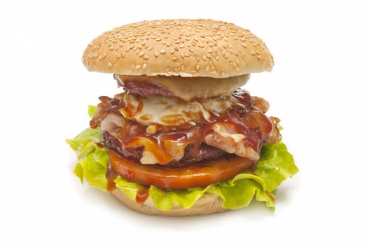 special burger with cheese, tomato, lettuce, meat, eggs, bacon and mustard sauce and tomato
