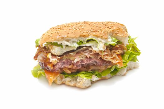 special burger with cheese, tomato, lettuce, meat, eggs, bacon and mustard sauce and tomato
