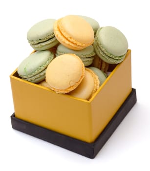 Colorful Macaron in paper box on white background