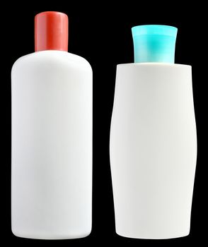 Bottles of cosmetic means on a black background.