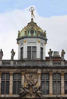 Dome of a building with statues of various