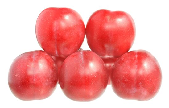 Ripe plums on a white background.
