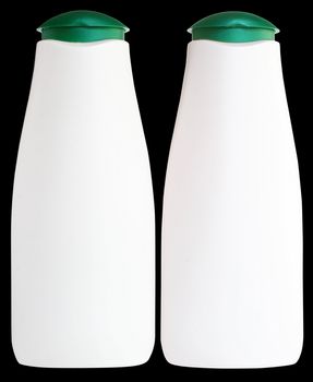 Two bottles with cosmetic means on a black background.