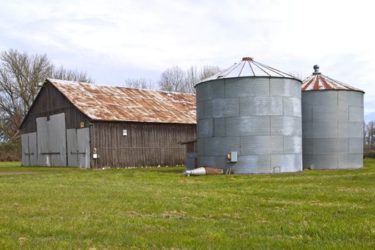 Old rusty abandoned storage shed and silo sheds, Oregon.