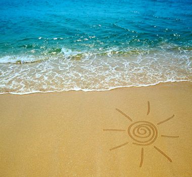 sun drawing on a beach