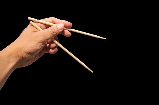 Use left hand to eat food with chopsticks